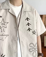 楽しいイラストが描かれた半袖シャツ