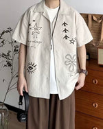 楽しいイラストが描かれた半袖シャツ